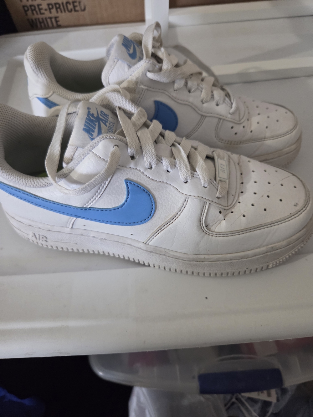 Nike Kids White Sneakers with Light Blue Swoosh